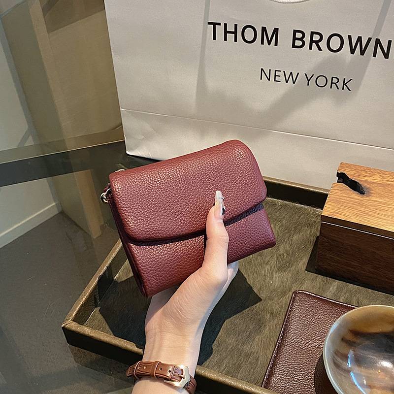 â°Unisex Pebble Leather lompakkođ„