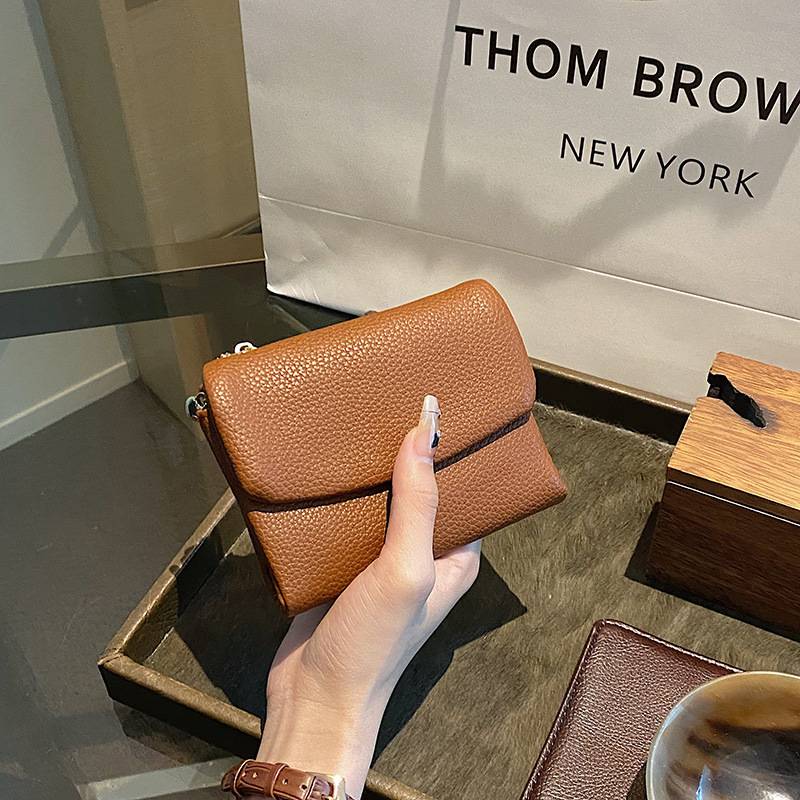 â°Unisex Pebble Leather lompakkođ„