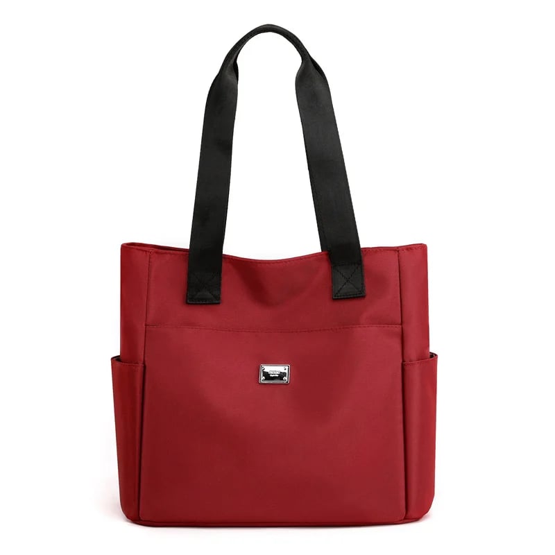 🔥Vattenavvisande axelväska i nylon med flera fickor och stor kapacitet👜