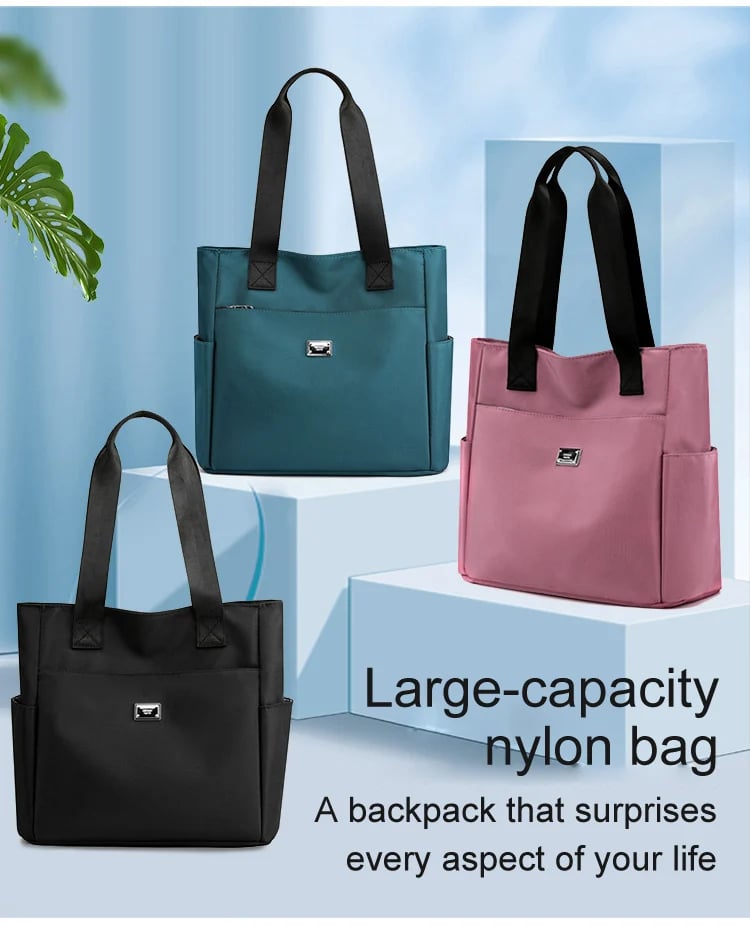 🔥Vattenavvisande axelväska i nylon med flera fickor och stor kapacitet👜