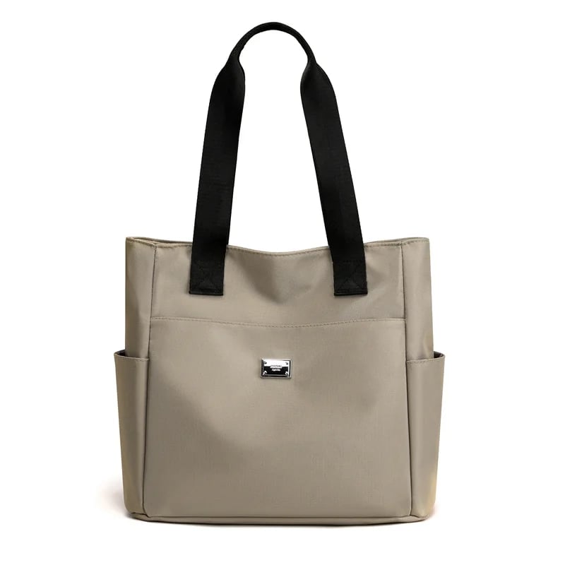 🔥Vattenavvisande axelväska i nylon med flera fickor och stor kapacitet👜