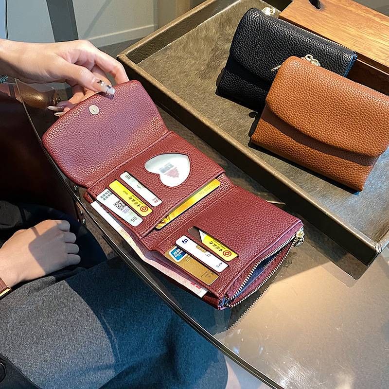 ⏰Unisex Pebble Leather lompakko🔥