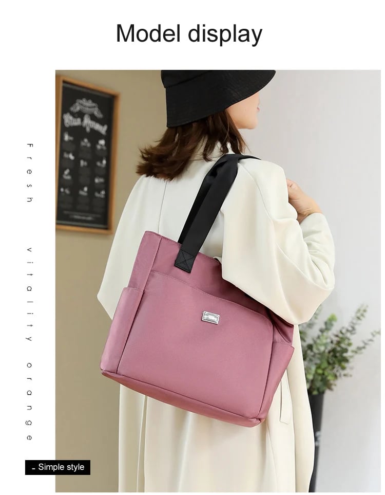 🔥Vattenavvisande axelväska i nylon med flera fickor och stor kapacitet👜